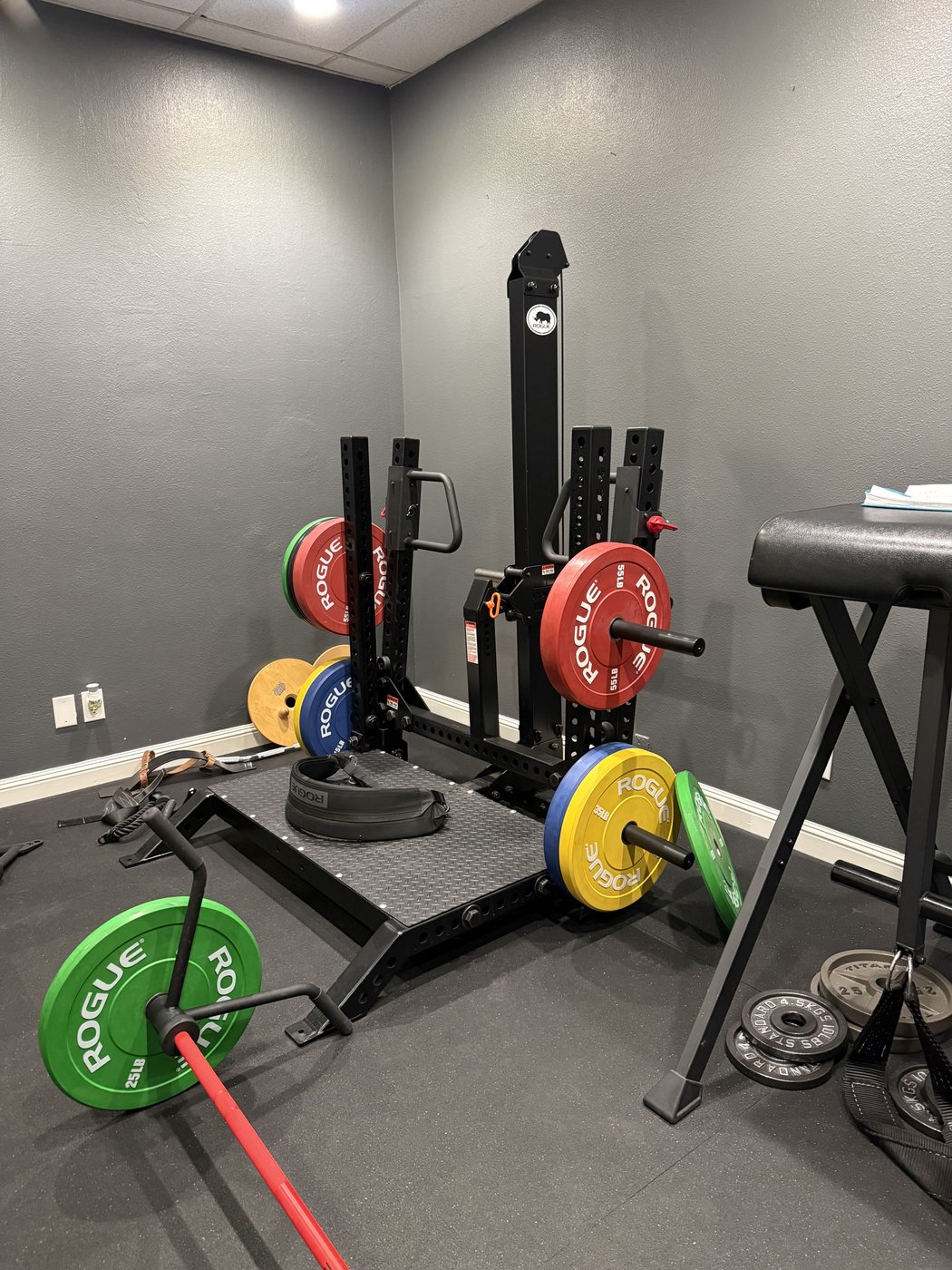 Barbell and weight storage at VAL Chiropractic